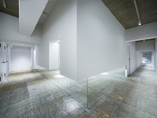 Sasaki Architectured convert a former disco club into an office space with floating walls