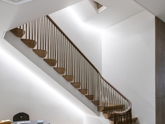 MKCA overhauls Upper East Side townhouse with custom staircase and furniture