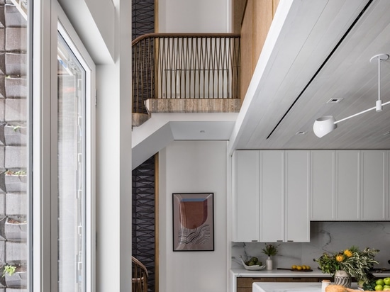 MKCA overhauls Upper East Side townhouse with custom staircase and furniture