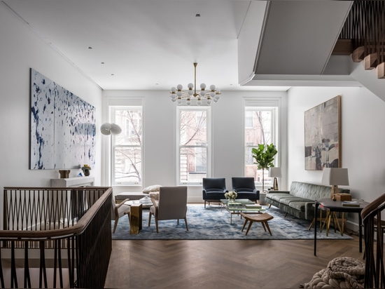 MKCA overhauls Upper East Side townhouse with custom staircase and furniture