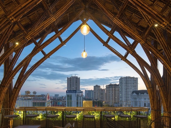 bamboo club + cafe by VTN architects takes center stage in the heart of vietnam