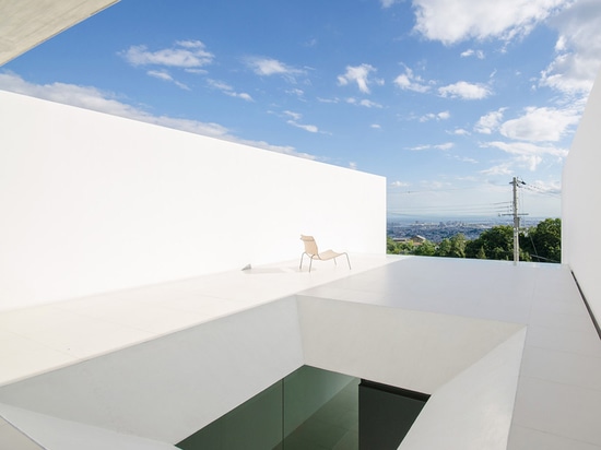 Thin concrete planes define mountain home in Japan by Kubota Architect Atelier