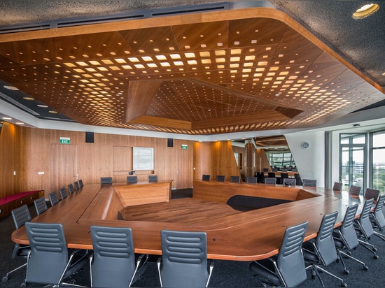 DP Architects and UNStudio, Singapore University of Technology and Design’s academic campus, Singapore. The geometry of the boardroom table, with its corresponding ceiling, is derived from the pano...