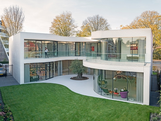 MVRDV curves casa kwantes around a single olive tree