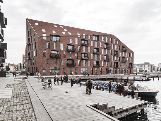 COBE + vilhelm lauritzen mimics existing warehouses in copenhagen housing project