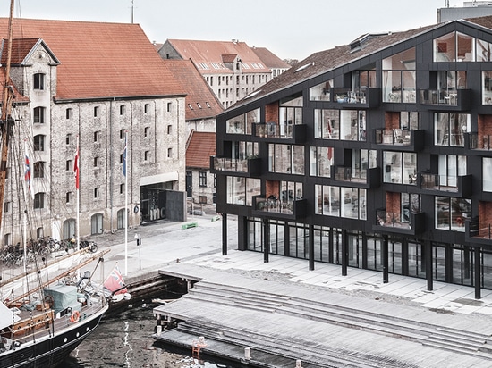 COBE + vilhelm lauritzen mimics existing warehouses in copenhagen housing project