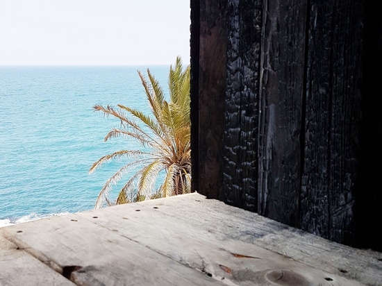 Kieran Donnellan works with students to build tiny clifftop chapel in Lebanon