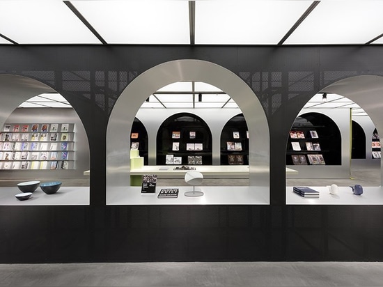 Hangzhou dreamscape marries the art of books with normann copenhagen furniture, by alberto caiola