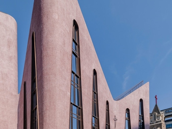 Inuce completes pink pebbledash church hall in Fuzhou