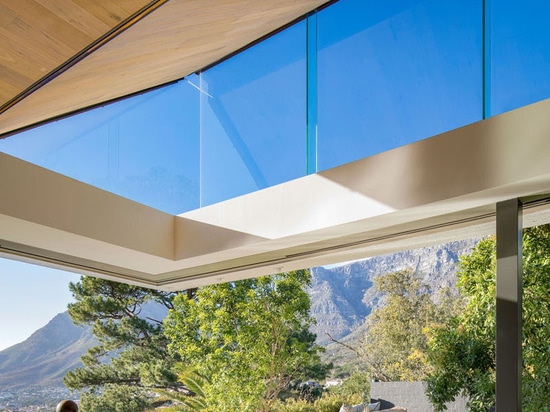 An Inverted Pyramid Roof Allows Light To Enter This Home In A Unique Way