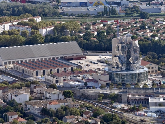 Frank Gehry's aluminium-clad Luma Arles tower takes shape in France