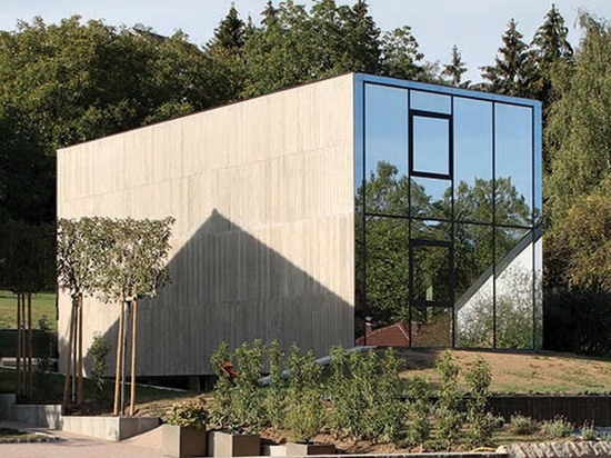 single-family house by 2001 juts like a concrete monolith from the ...