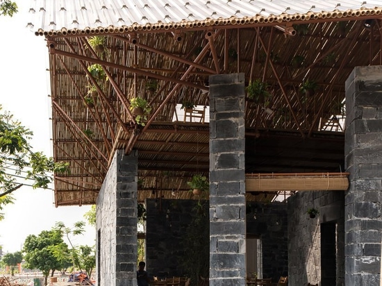 H&P architects builds cultural community space in vietnam out of waste materials and debris