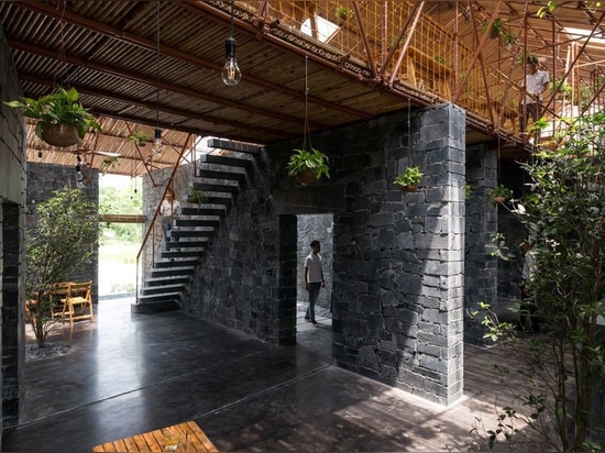 H&P architects builds cultural community space in vietnam out of waste materials and debris