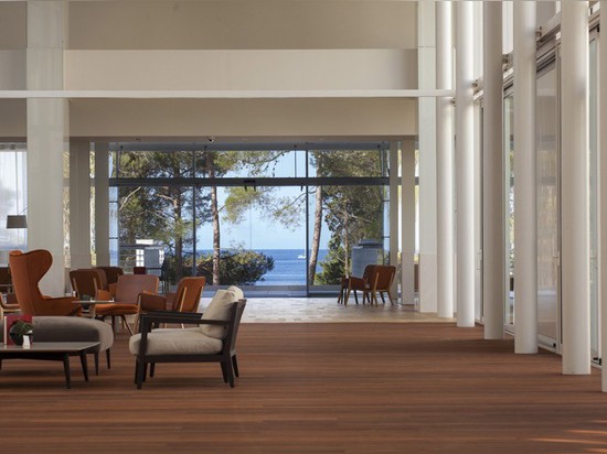 glazed passageway leading from atrium to seaside patio