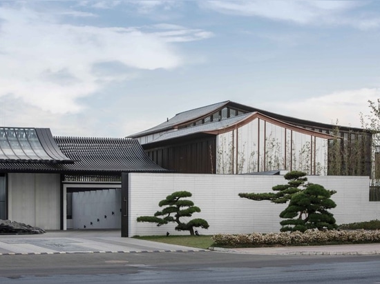 lacime architects reflects the suzhou leisure center in pools of water in china