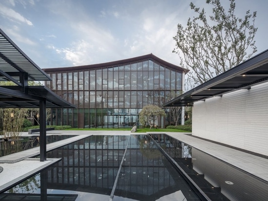 lacime architects reflects the suzhou leisure center in pools of water in china