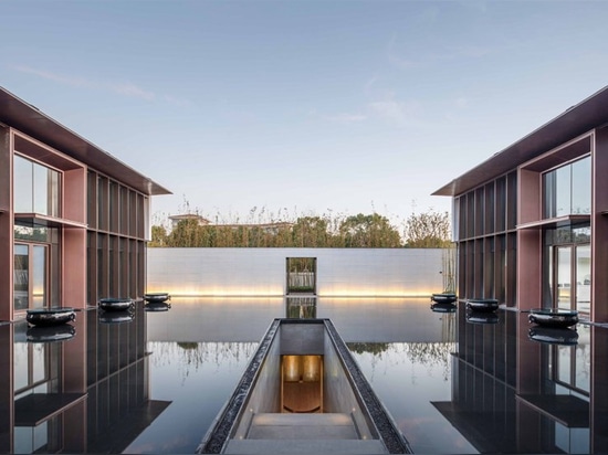 lacime architects reflects the suzhou leisure center in pools of water in china