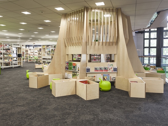 a sculptural timber book shelf