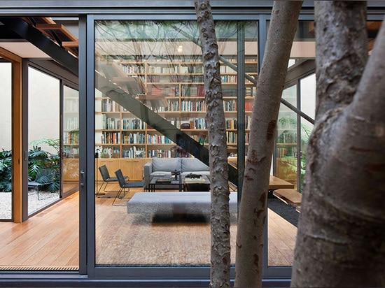 glazed partitions ensure that the home is read as a singular environment