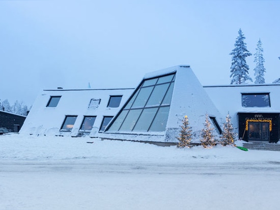 A Collection of Unique Cabins With Large Windows And Lofted Bedrooms Was Designed For This Holiday Destination In Finland