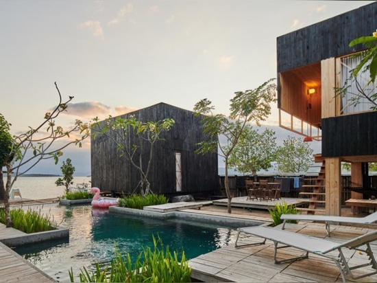 A beachside resort on a remote Indonesian island resembles a traditional village