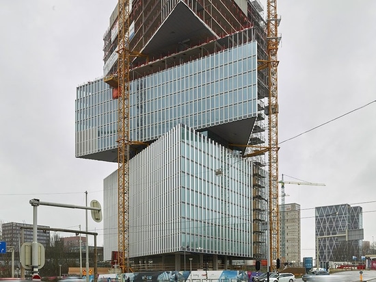 OMA / reinier de graaf's Nhow amsterdam RAI hotel tops out