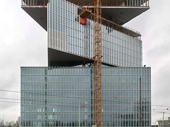 OMA / reinier de graaf's Nhow amsterdam RAI hotel tops out