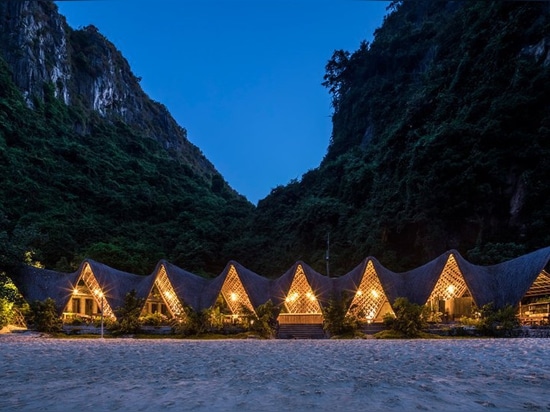 VTN architects' bamboo 'castaway island' resort gently occupies a vietnamese island shore