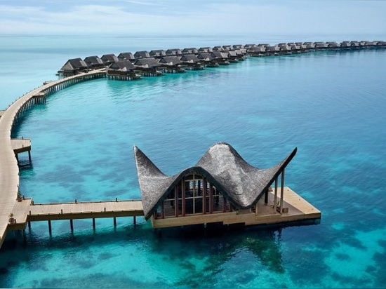 this luxury resort by autoban draws from the maldives' vernacular architecture