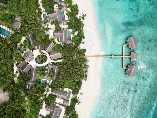 this luxury resort by autoban draws from the maldives' vernacular architecture