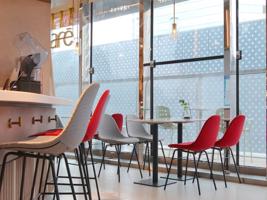 Ta Up Chairs by TOOU, surrounded by the colored atmosphere of the Elle Café in Shanghai.