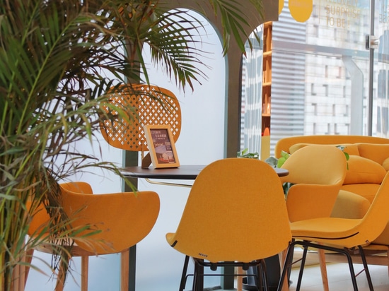 Ta Up Chairs by TOOU, surrounded by the colored atmosphere of the Elle Café in Shanghai.