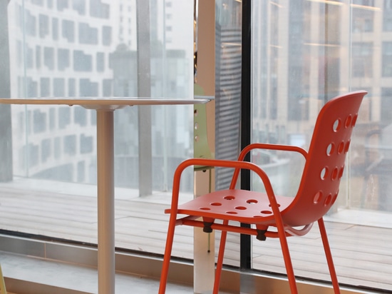 Ta Up Chairs by TOOU, surrounded by the colored atmosphere of the Elle Café in Shanghai.