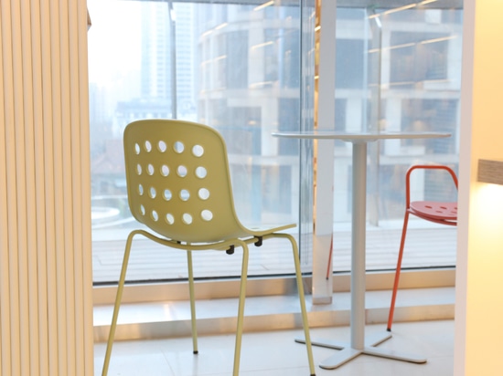 Ta Up Chairs by TOOU, surrounded by the colored atmosphere of the Elle Café in Shanghai.