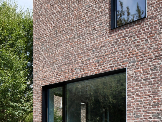 Belgian bottling house converted into family home by Architecture Cotugno Thiry