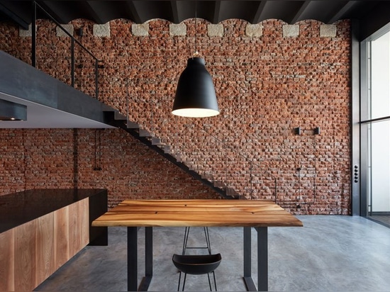 abandoned brewery storage units in prague restored into industrial lofts by CMC architects