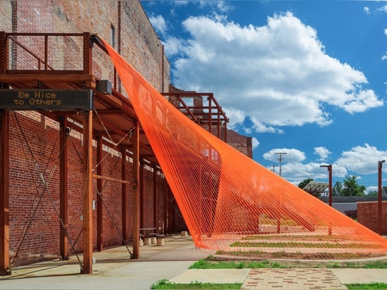 behin ha builds temporary shade installation in ohio using scrap mesh fabric