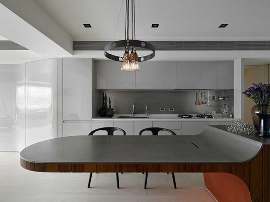 Kitchen Island Idea – A Multi-Height Island With Cantilevered Table And Seating