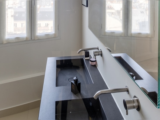 The Haussmann style of a flat in Paris brought up to date by Ritmonio Diametro 35 Inox.