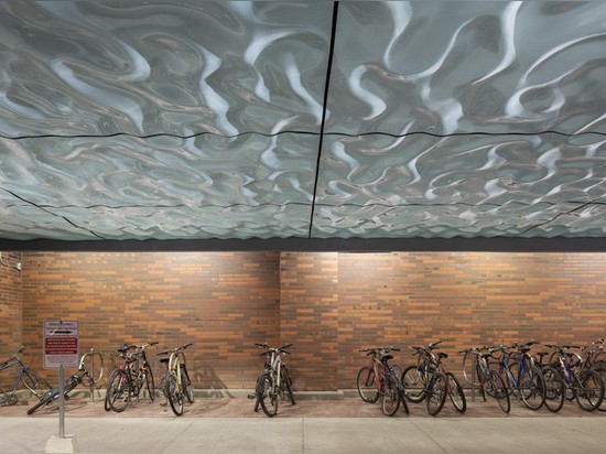 Paul Raff Studio Add Water-Like Sculpture To Ceiling Of Parking Area