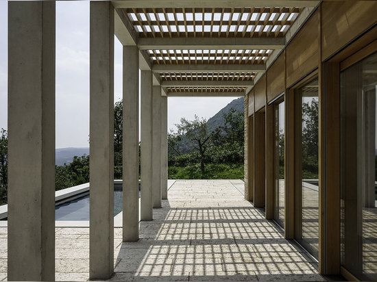 The timber and concrete structure that defines the design's main facade references local architecture... Photography courtesy of David Chipperfield Architects