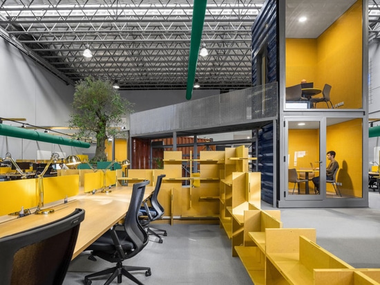 A Warehouse Is Transformed with Shipping Containers into Innovative Office