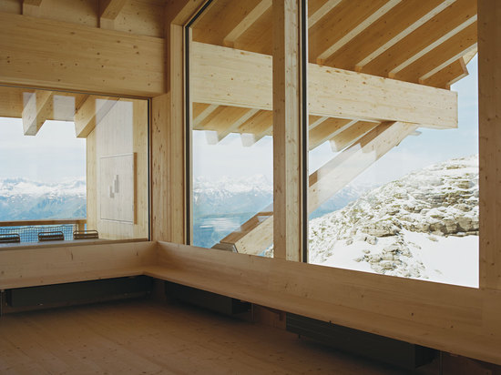 Making the most of the panoramic Alpine views, the restaurant features three (almost) floor-to-ceiling, triple glazed windows   Read more at http://www.wallpaper.com/architecture/on-the-summit-herz...