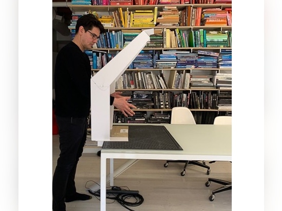 Architect Eric Höweler and a cantilevered PIH mock-up in his office.