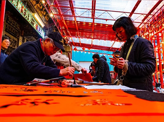 Under the transparent shelter, the open space is perfect for calligraphy events during chinese new year