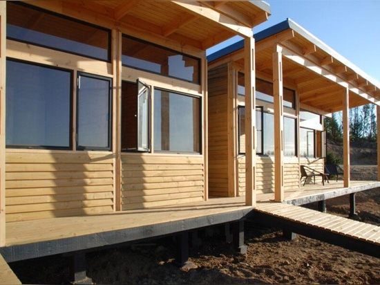 Solar-powered timber home in Chile embraces ocean views