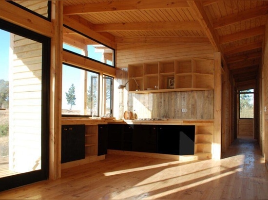 Solar-powered timber home in Chile embraces ocean views