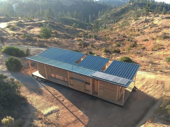 Solar-powered timber home in Chile embraces ocean views