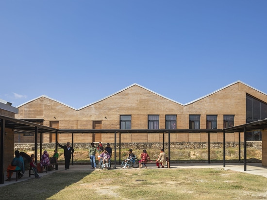 Native plants and gabled roofs were implemented to provide a domestic aesthetic to the hospital campus.